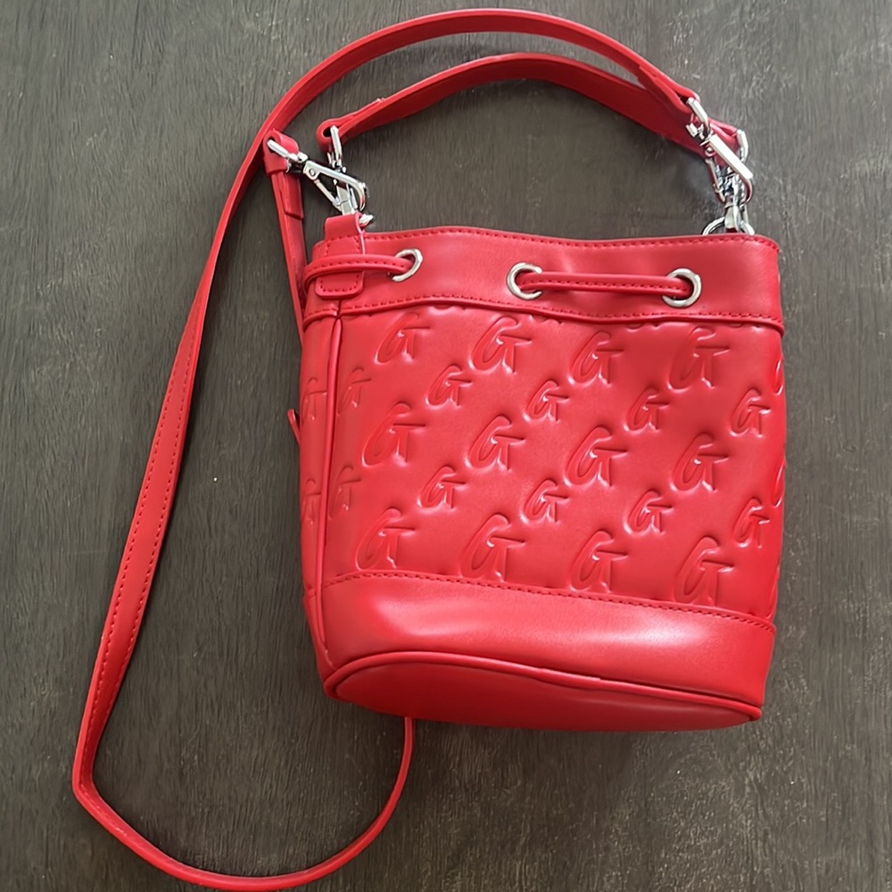 Red glamaholic purse. New condition worn one time .